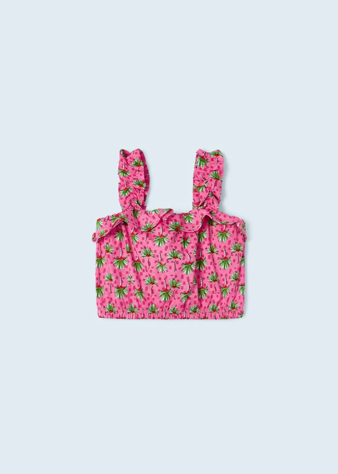 Blusa de tirantes para niña en color rosa con estampado tropical de frutas y volantes en los tirantes. Diseño ligero y fresco, ideal para los días de verano.