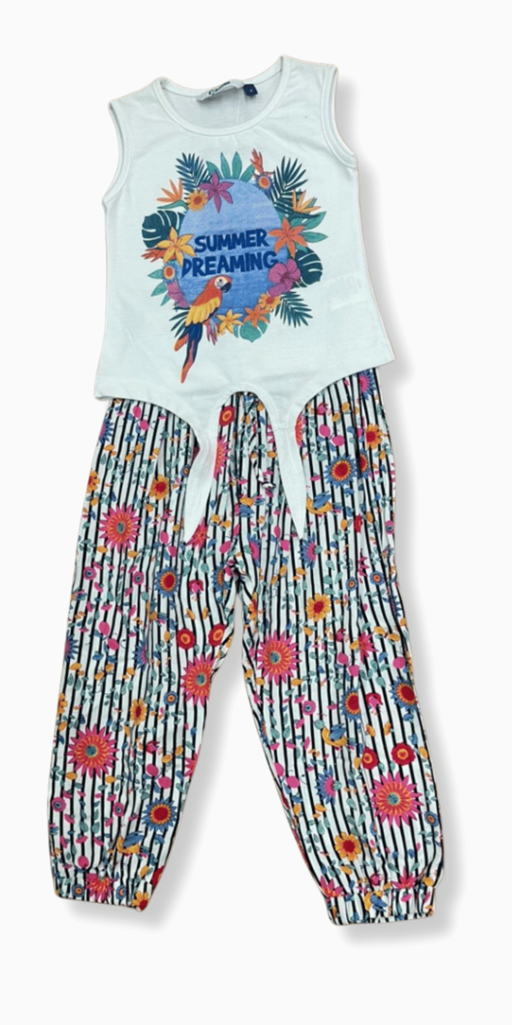 Conjunto infantil con blusa sin mangas en color blanco con estampado tropical “Summer Dreaming” y pantalón estampado de flores y rayas, ideal para un look fresco y colorido.