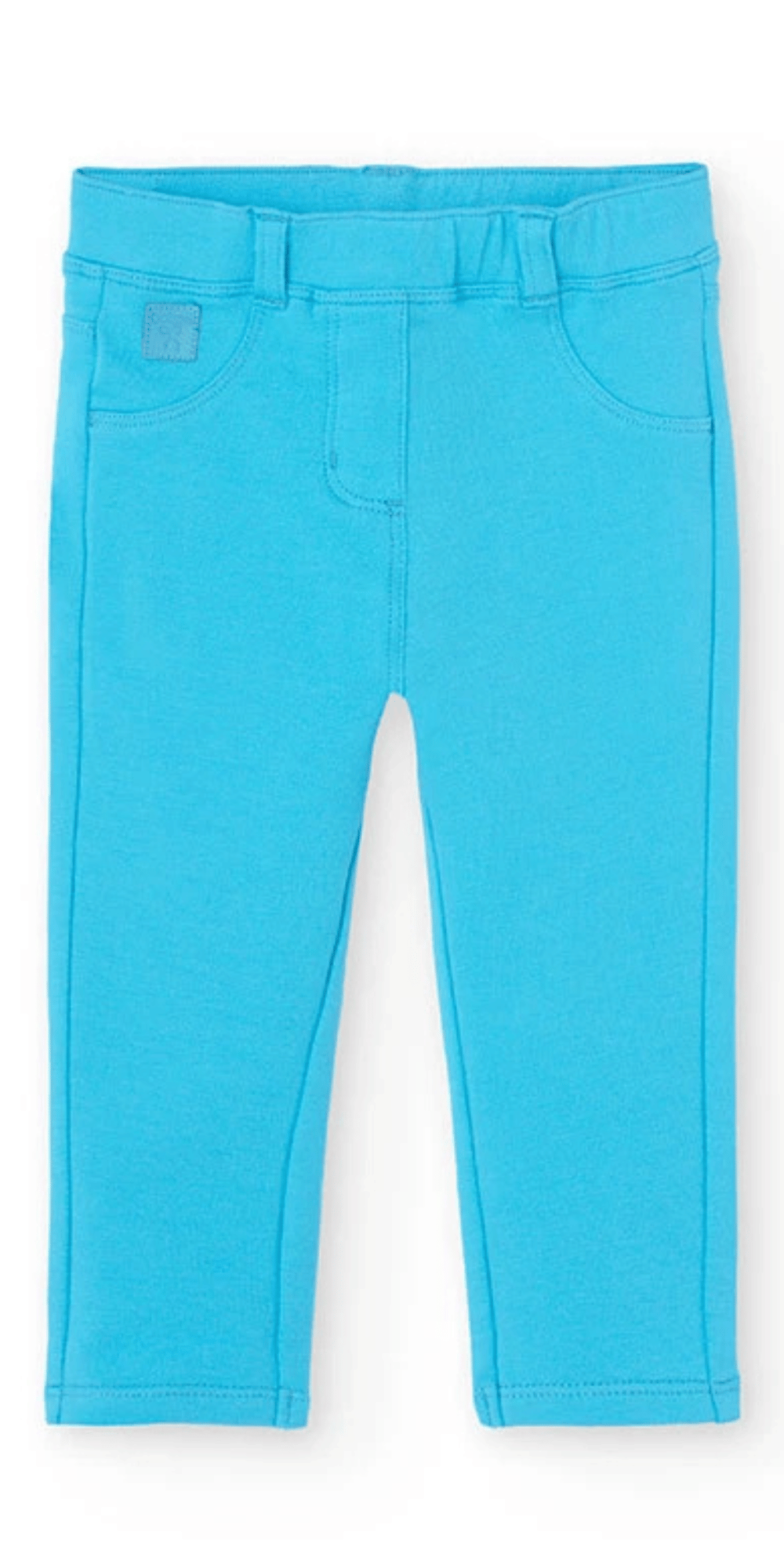 Leggings de niña en color azul brillante con cintura elástica y bolsillos delanteros decorativos