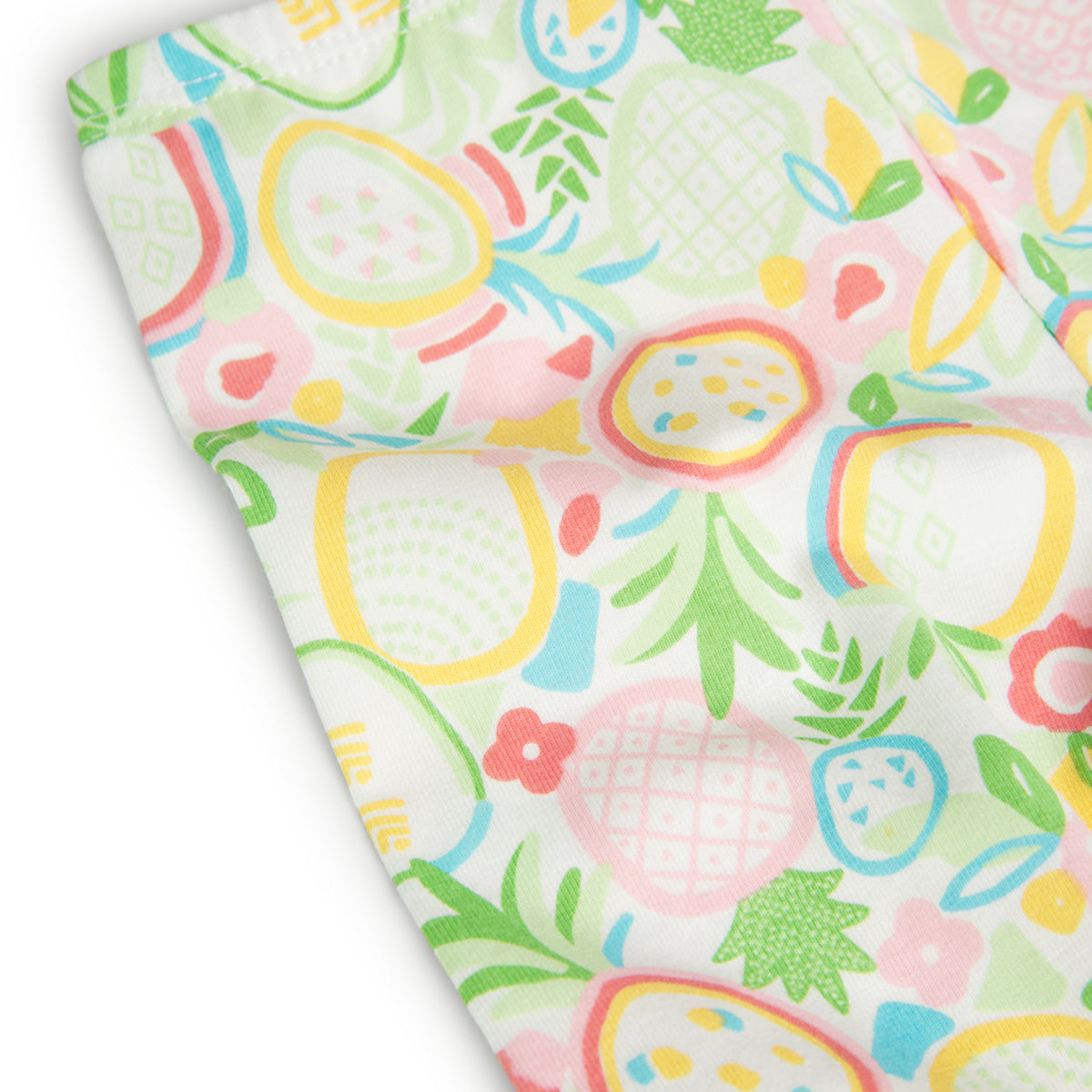 Detalle del estampado de frutas en los leggings infantiles de Boboli. Tela de algodón suave y elástica para mayor comodidad.