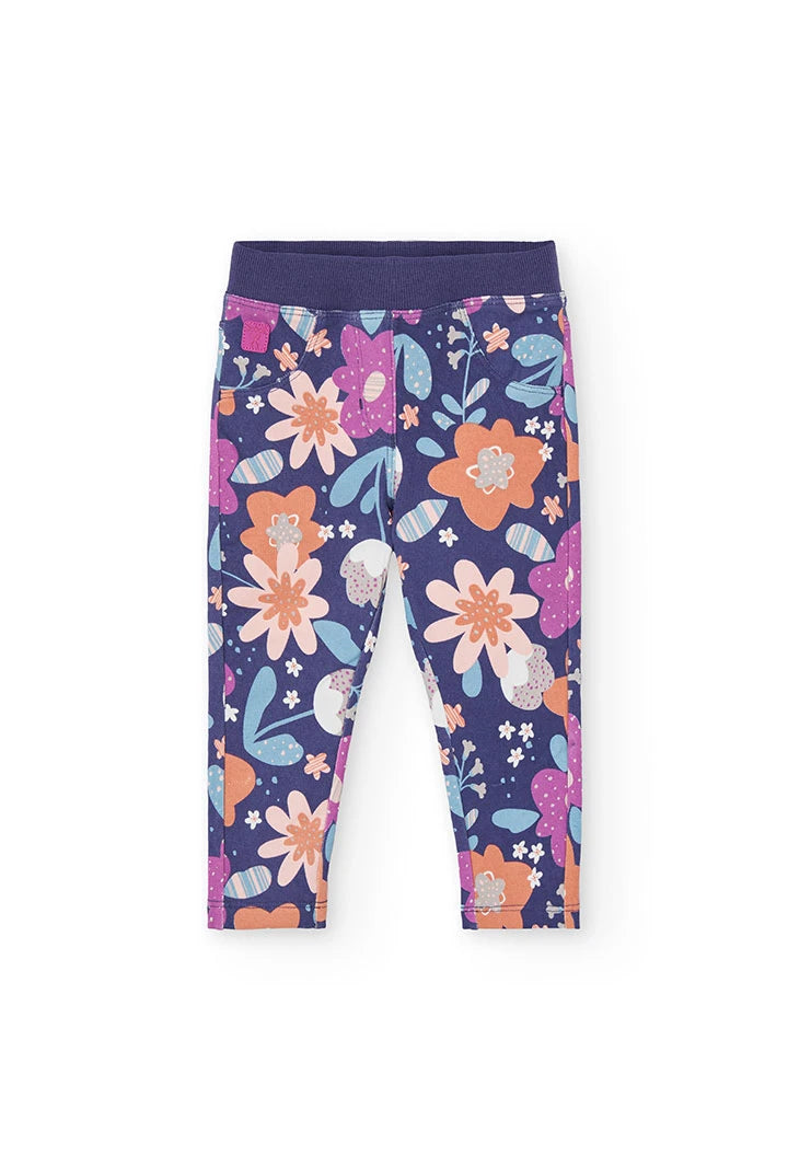 Vista frontal de unos leggings para niña con estampado floral vibrante y cintura elástica, marca Boboli.