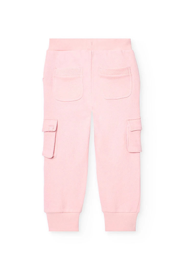 Vista trasera de pants rosas de niña con bolsillos y bolsillos cargo laterales.