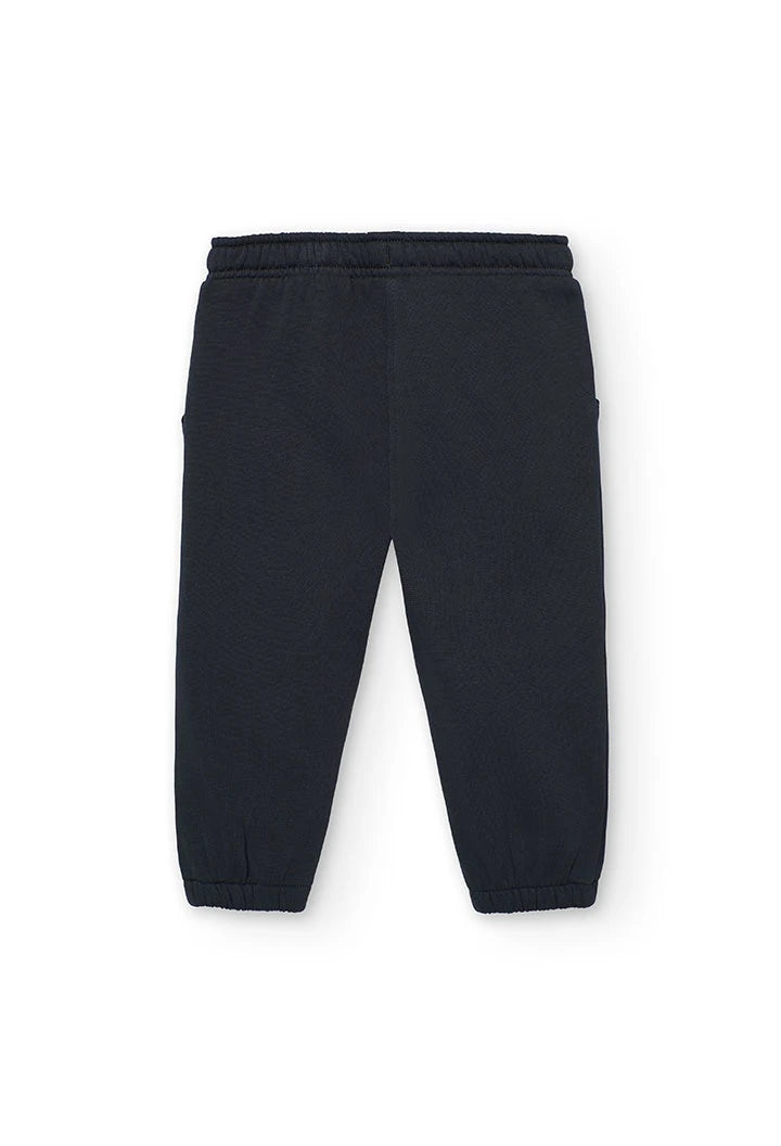 Vista trasera del pantalón jogger de felpa color carbón para niña.