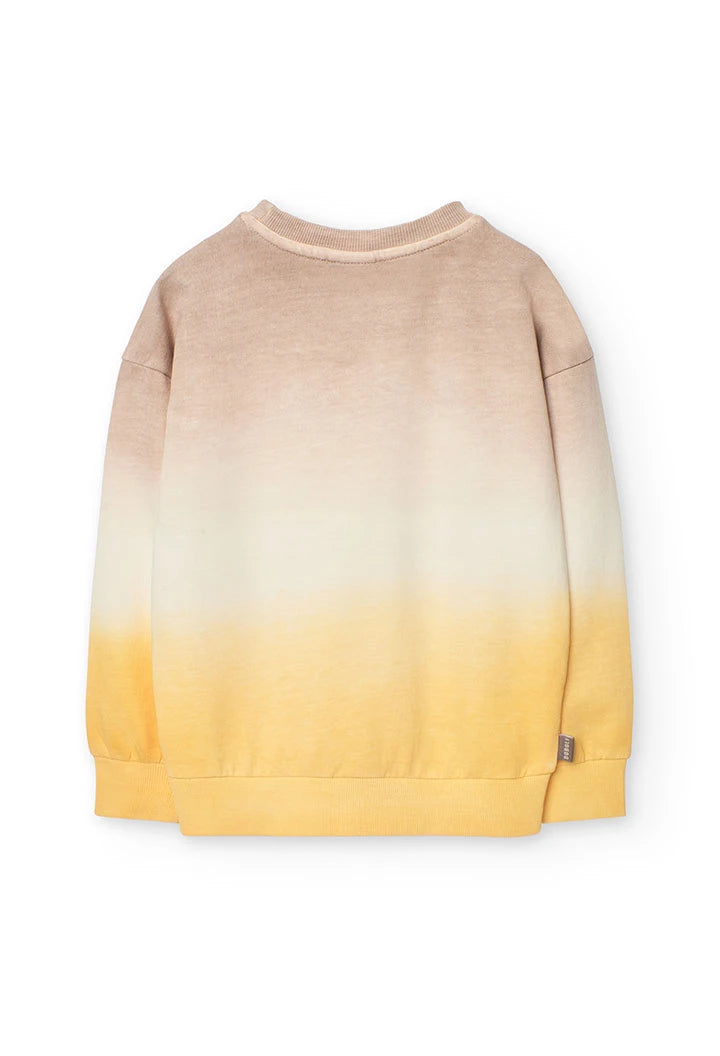 Vista trasera de la sudadera infantil con diseño degradado en tonos beige y amarillo, sin estampados.