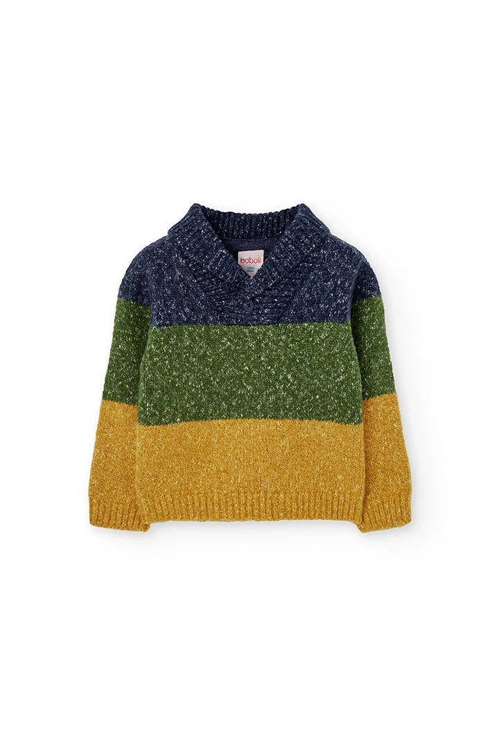 Vista frontal de un suéter de punto para niño con cuello chal y bloques de color azul marino, verde y amarillo, marca Boboli.