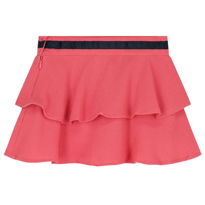 Vista trasera de la falda rosa Boboli de Cachaboo con volantes en capas, cierre lateral y cinturilla decorativa.