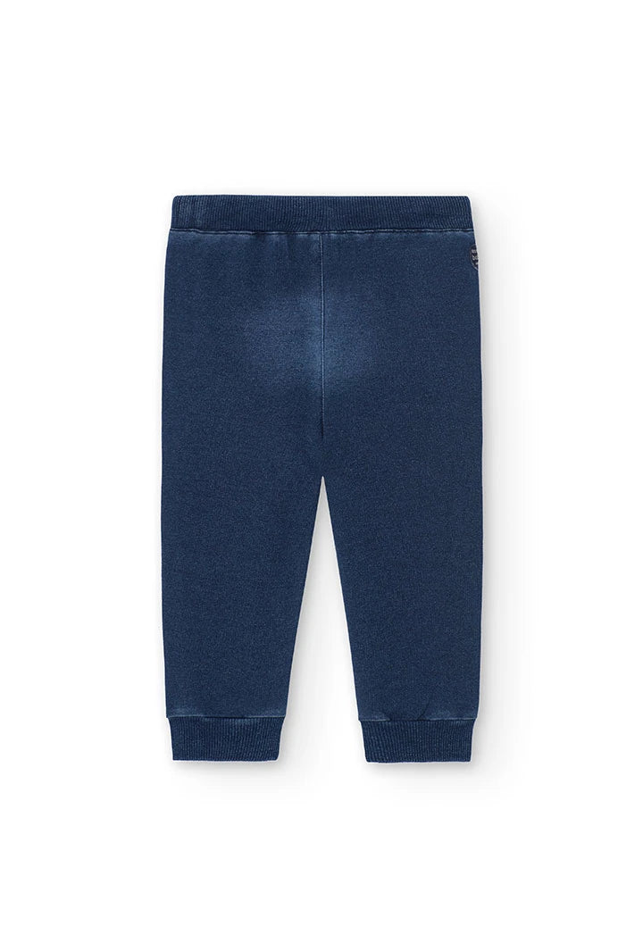 Vista trasera de pants tipo jogger azul marino para bebé o niño pequeño, con pretina elástica.