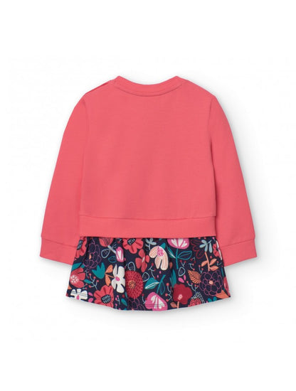 Vista trasera del vestido sudadera Boboli de Cachaboo en color rosa, con falda floral integrada y diseño cómodo para niñas.